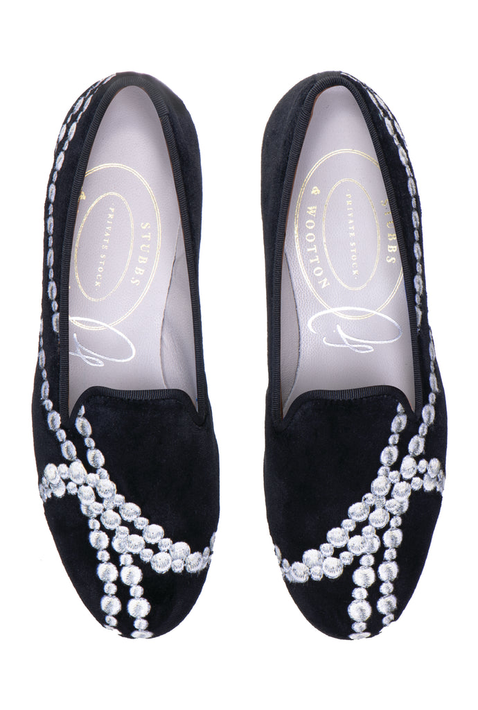 pearls embroidery over black slipper