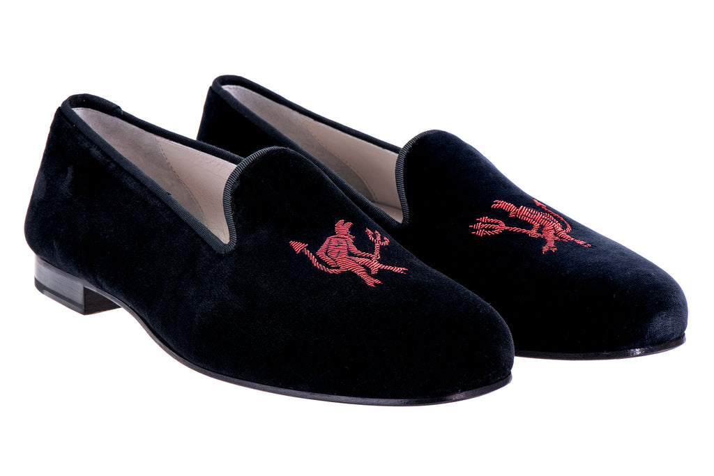 Our dancing devil slipper on a white background.