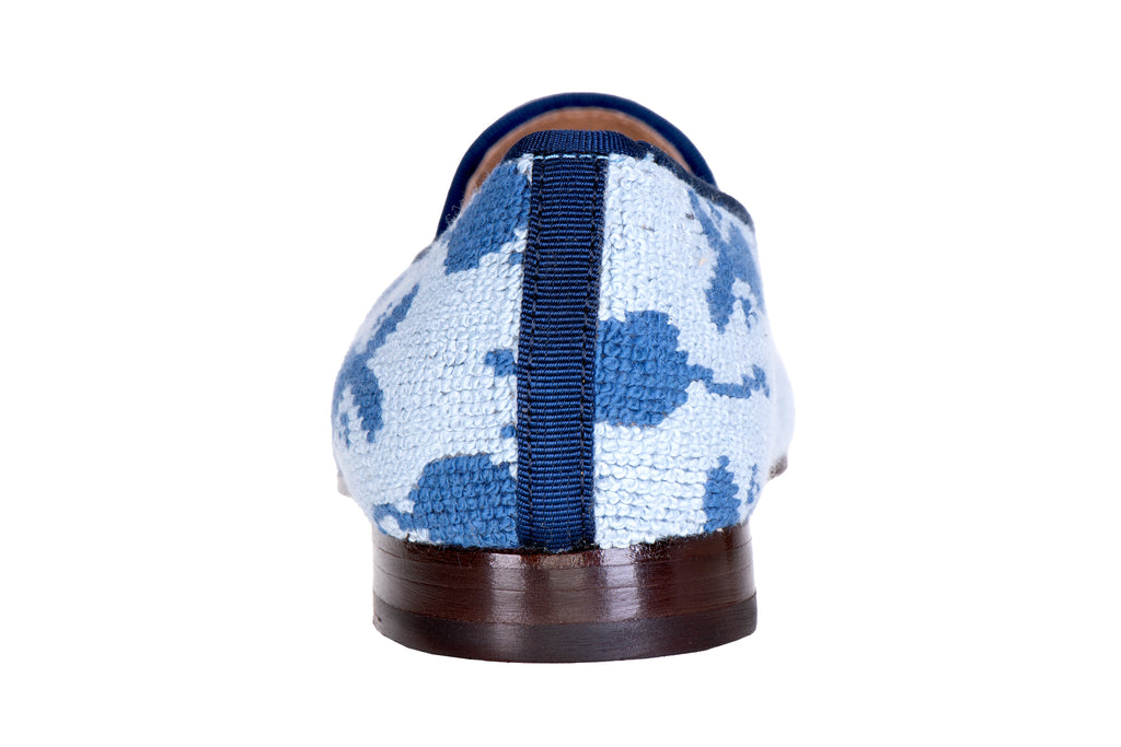 Our needlepoint blue mouse slipper on a white background.