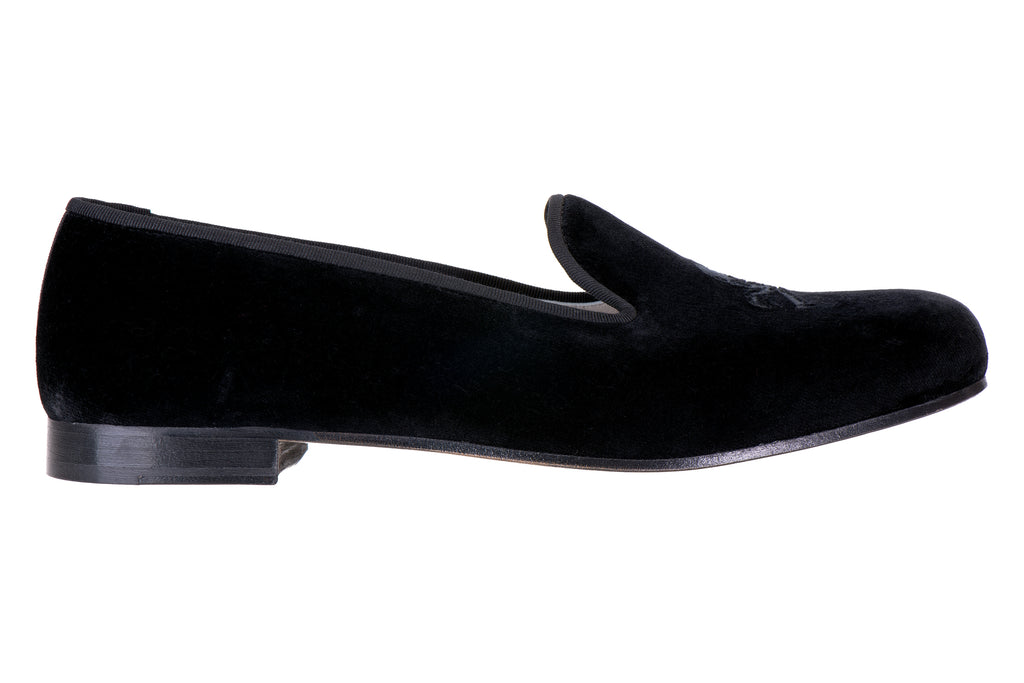 Our bones noir slipper item on a white background.