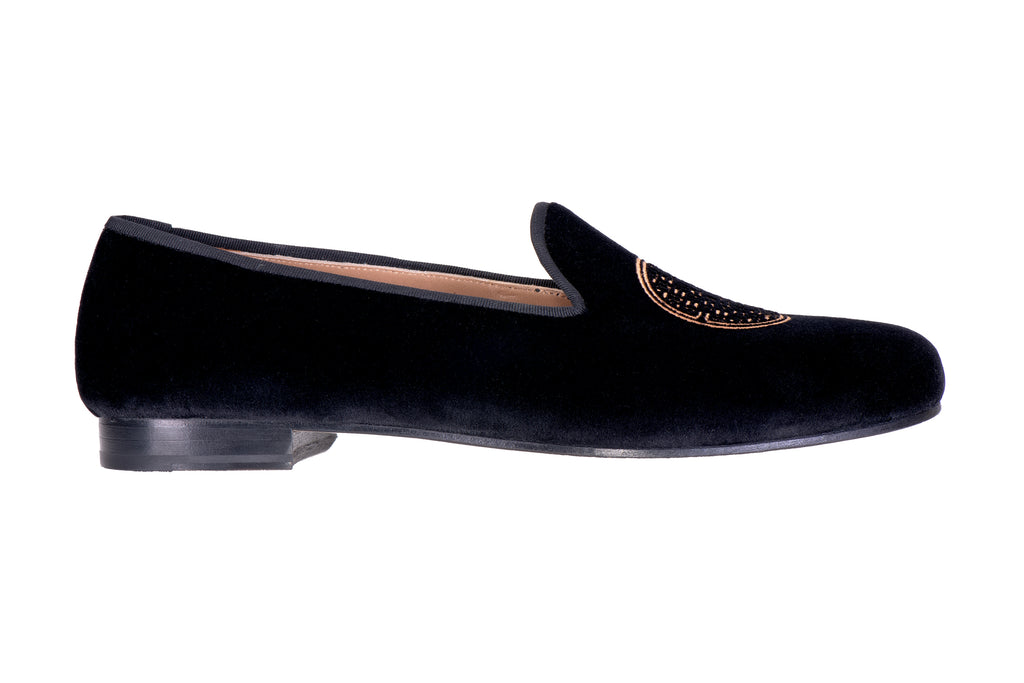 Our metropolis velvet slipper on a white background.