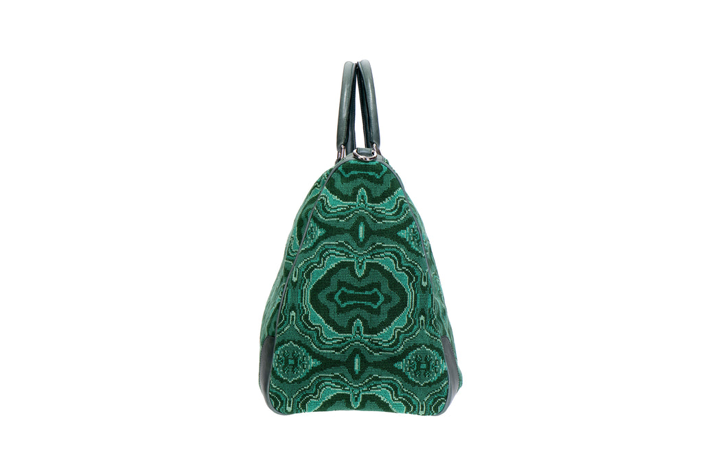 Our malachite weekender on a white background.