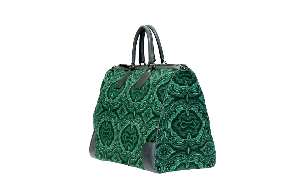 Our malachite weekender on a white background.