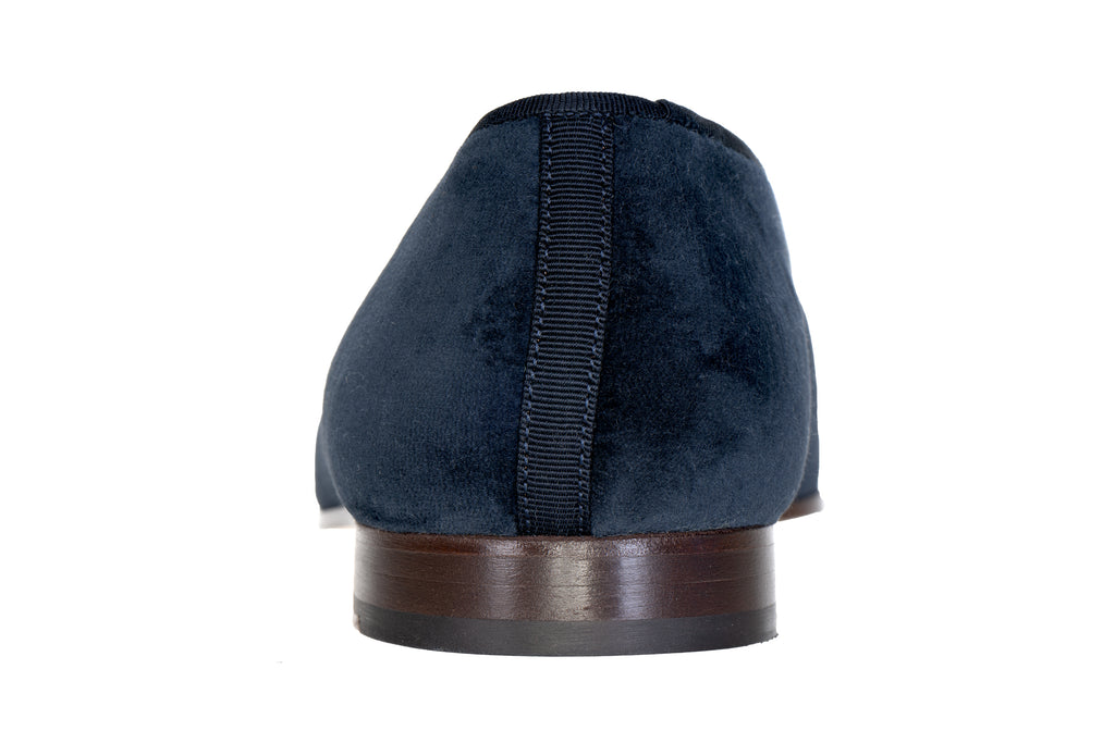 Our PB Crest Navy Men Slipper item is photographed here against a white background.