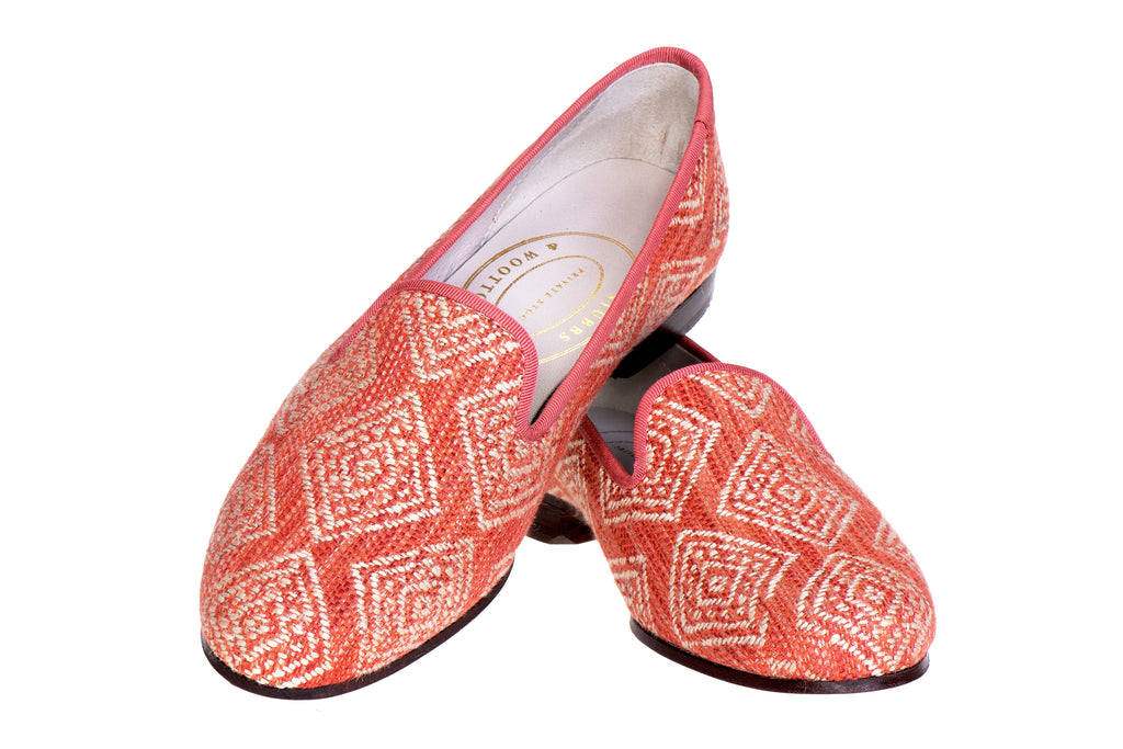 Our red perinne slipper item on a white background.