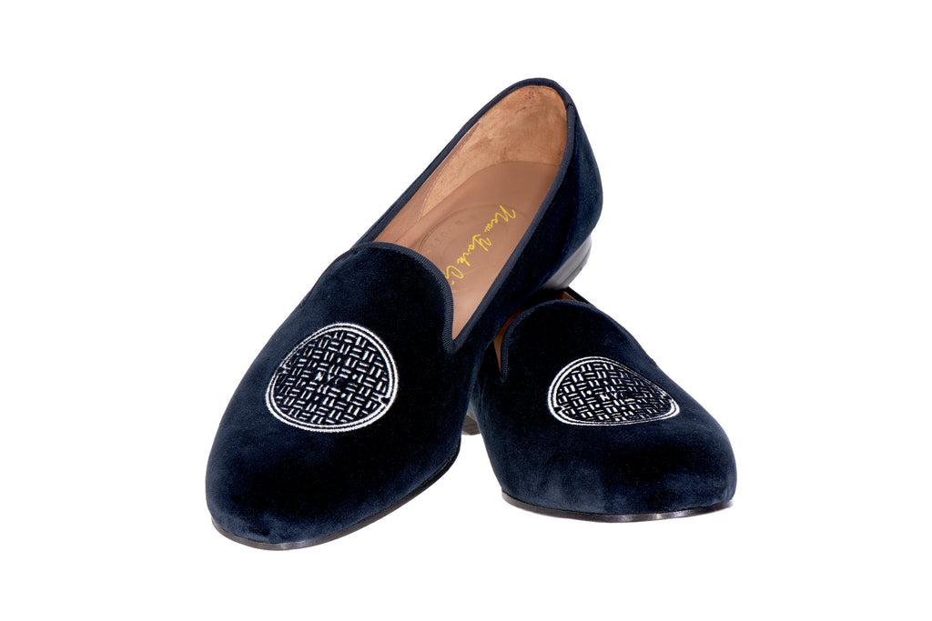 Our metropolis velvet slipper on a white background.