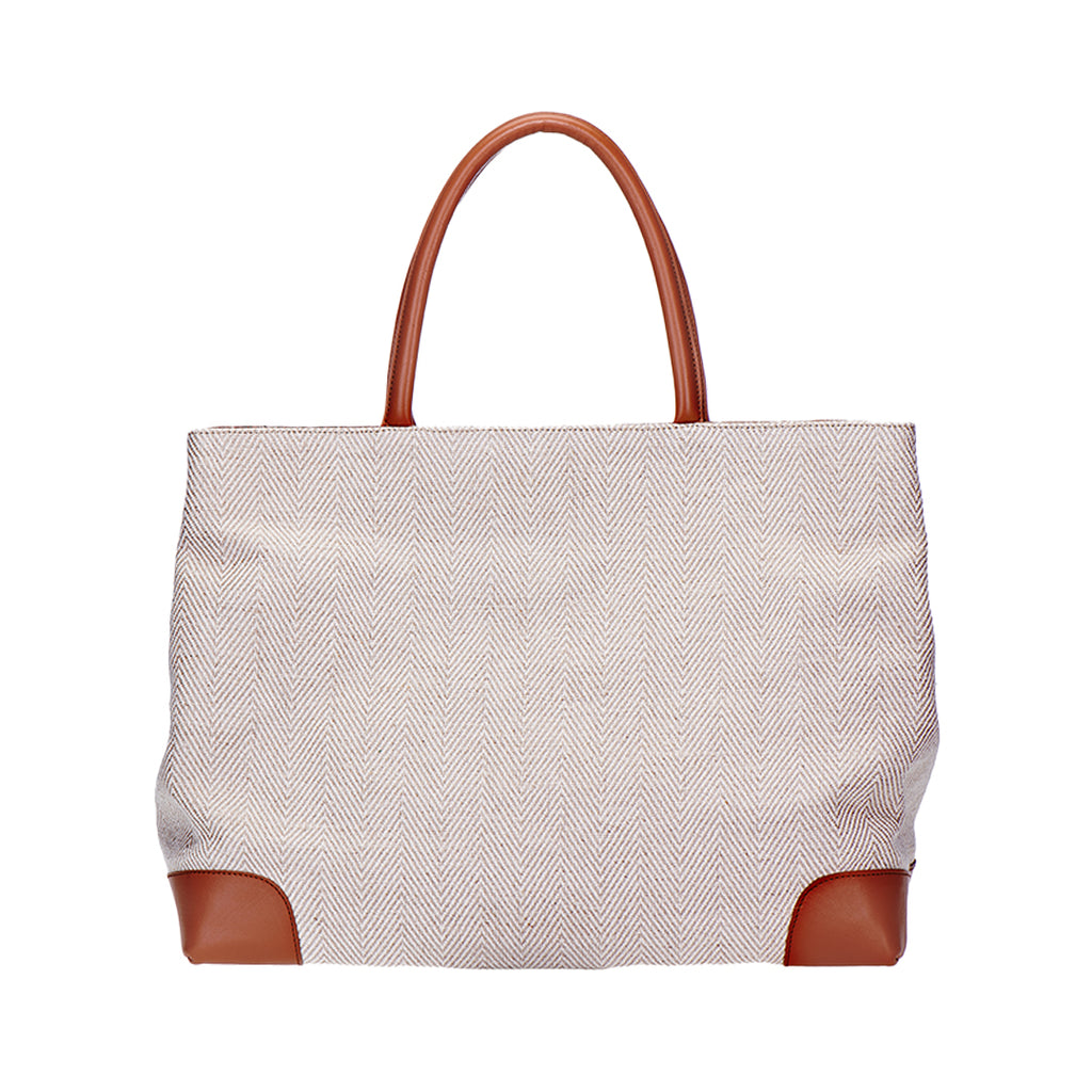 Our Herringbone Tote Bag is photographed here against a white background.