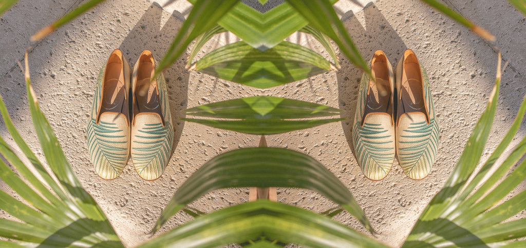 A reflected photograph of the Fronds Panama Slipper in Palm Beach.