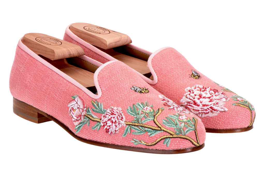 Our pink slipper with pink flowers on a white background.
