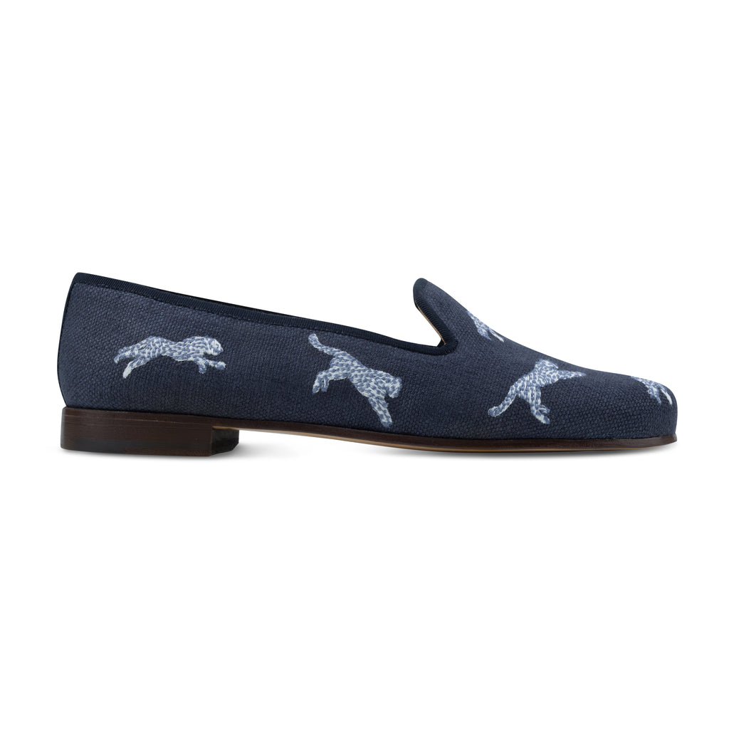 Our Allover Cheetah Navy Linen Slipper (Women) item is photographed here against a white background.