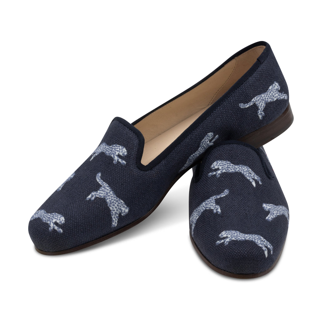 Our Allover Cheetah Navy Linen Slipper (Women) item is photographed here against a white background.