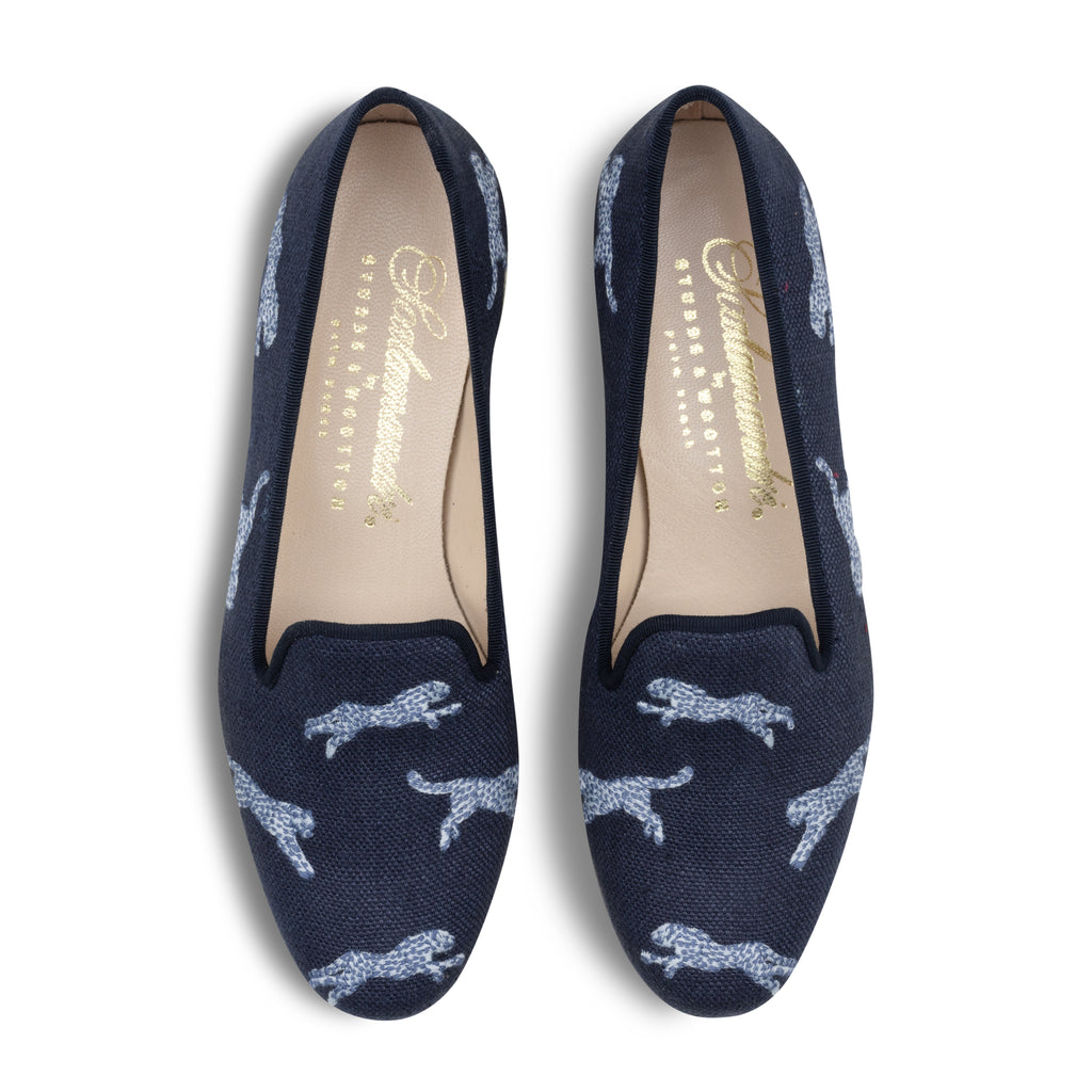 Our Allover Cheetah Navy Linen Slipper (Women) item is photographed here against a white background.