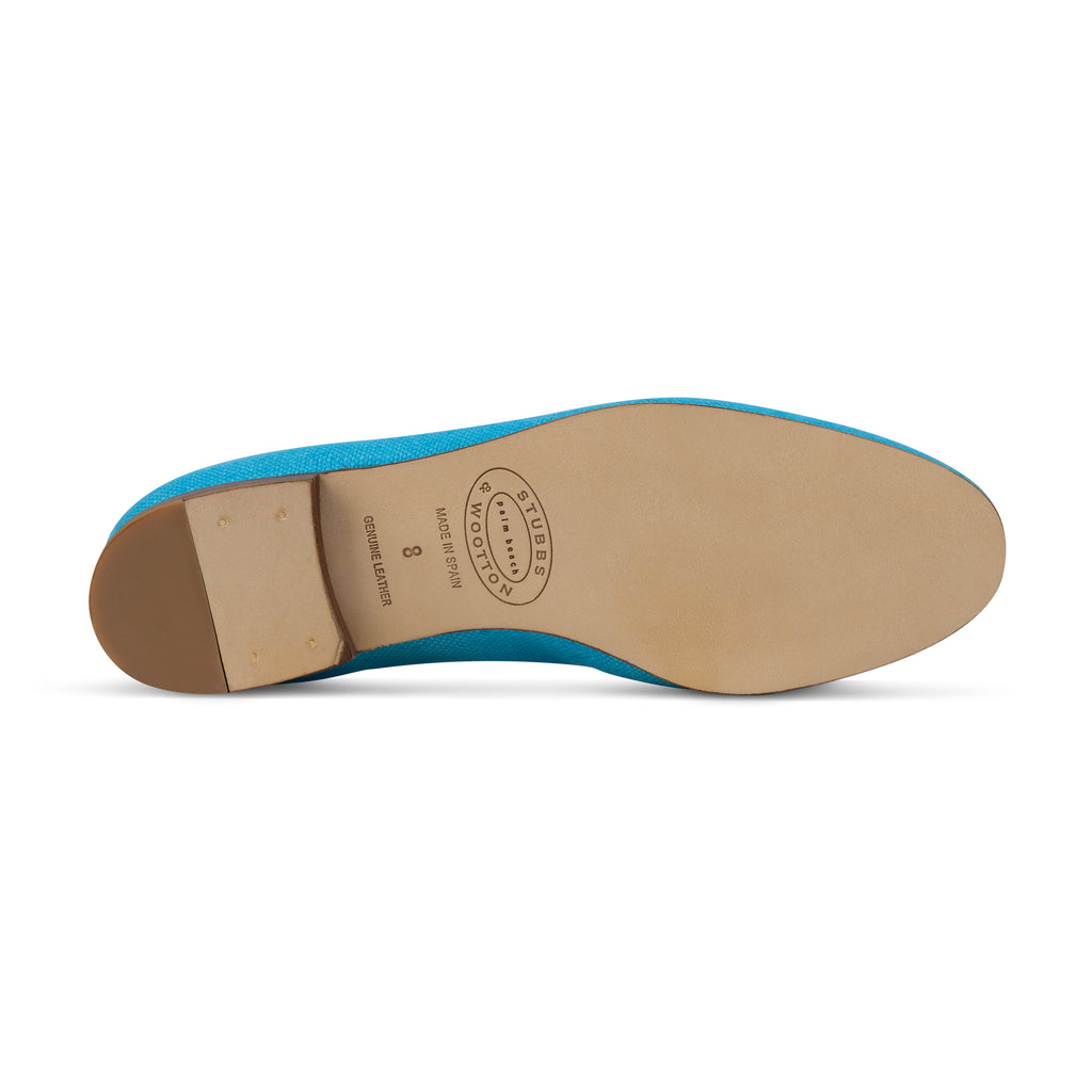 Our Celebrate Turquoise Linen Slipper (Women) item is photographed here against a white background.