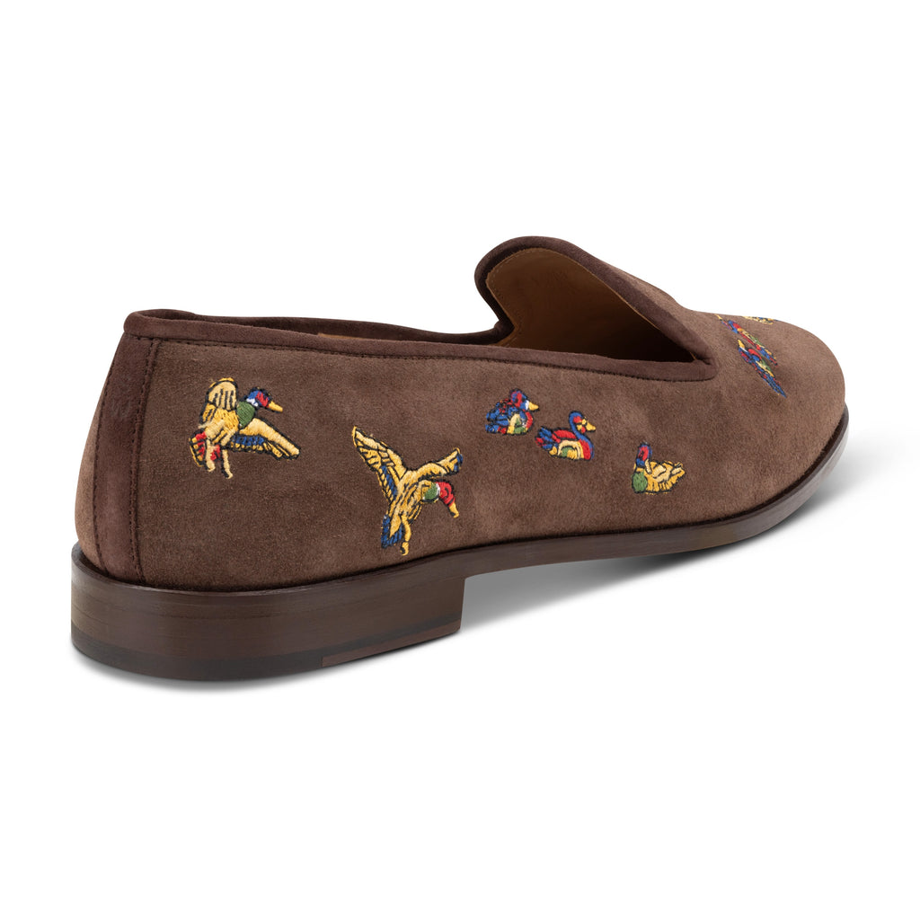 Our Flock Espresso Suede Slipper (Men) item is photographed here against a white background.