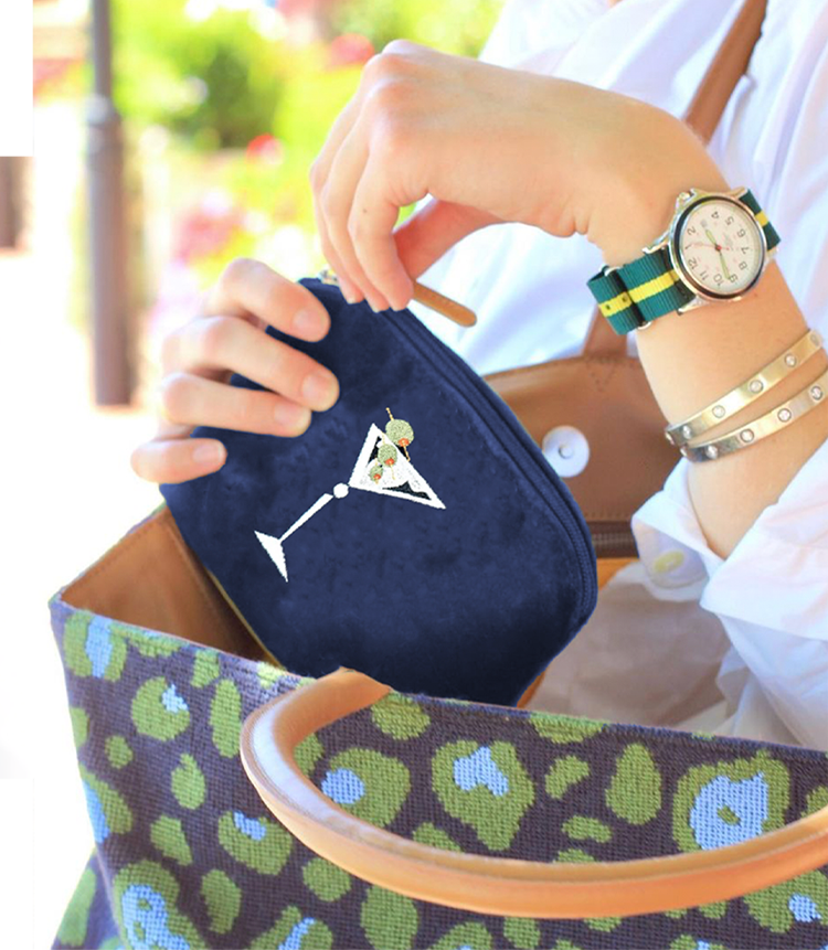 A lady holding our navy Martini pocket.