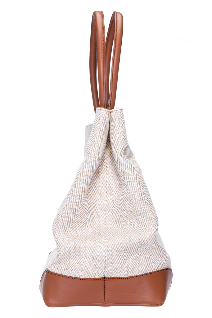 Our Herringbone Tote item is photographed here against a white background.